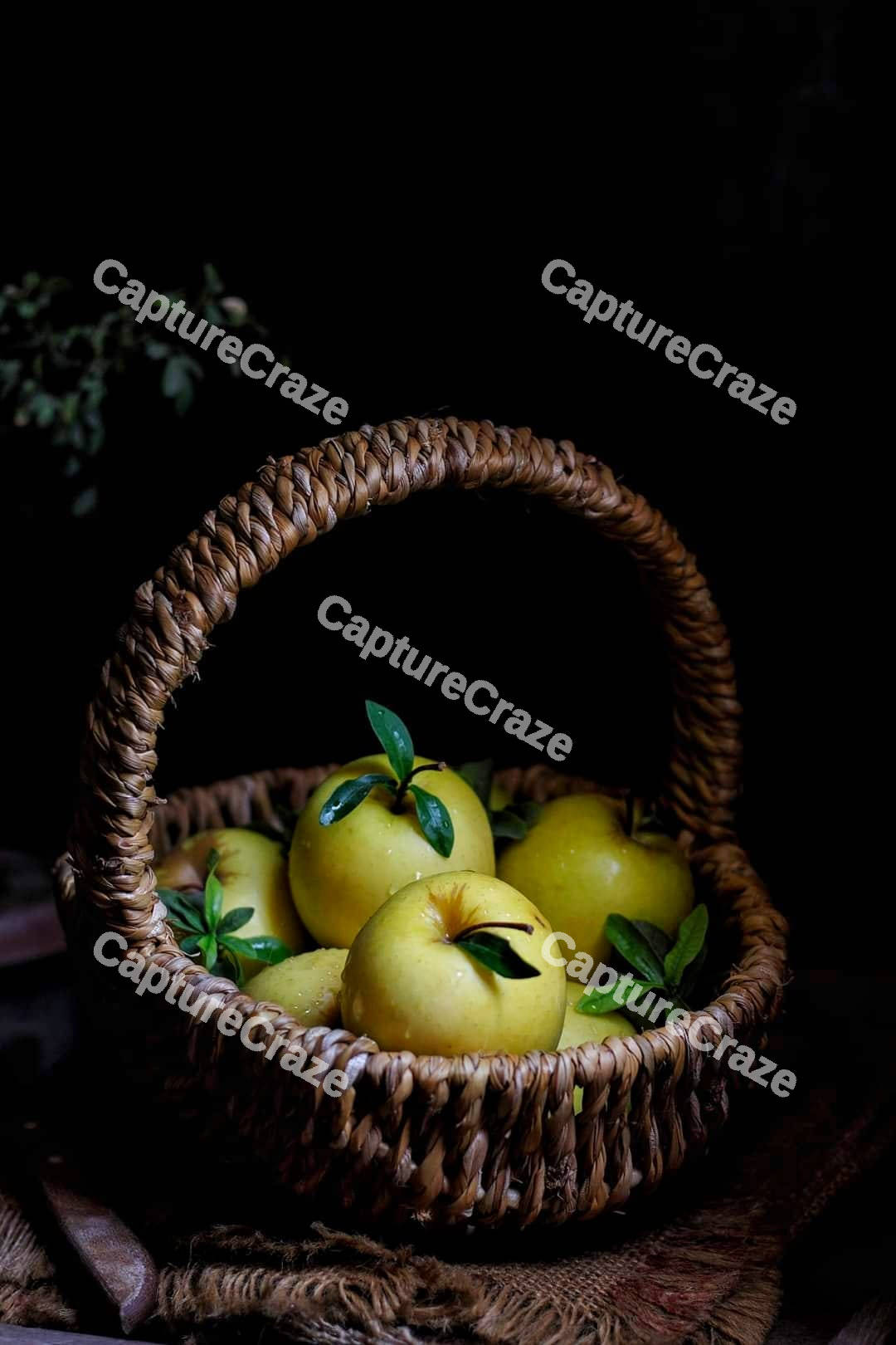 Straw basket with apples